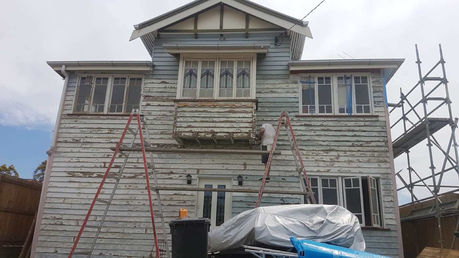 Interior wall during paint preparation in a Brisbane Queenslander renovation