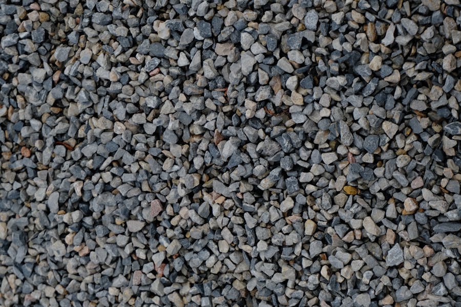 Close-up of clean angular crushed gravel used for drainage backfill