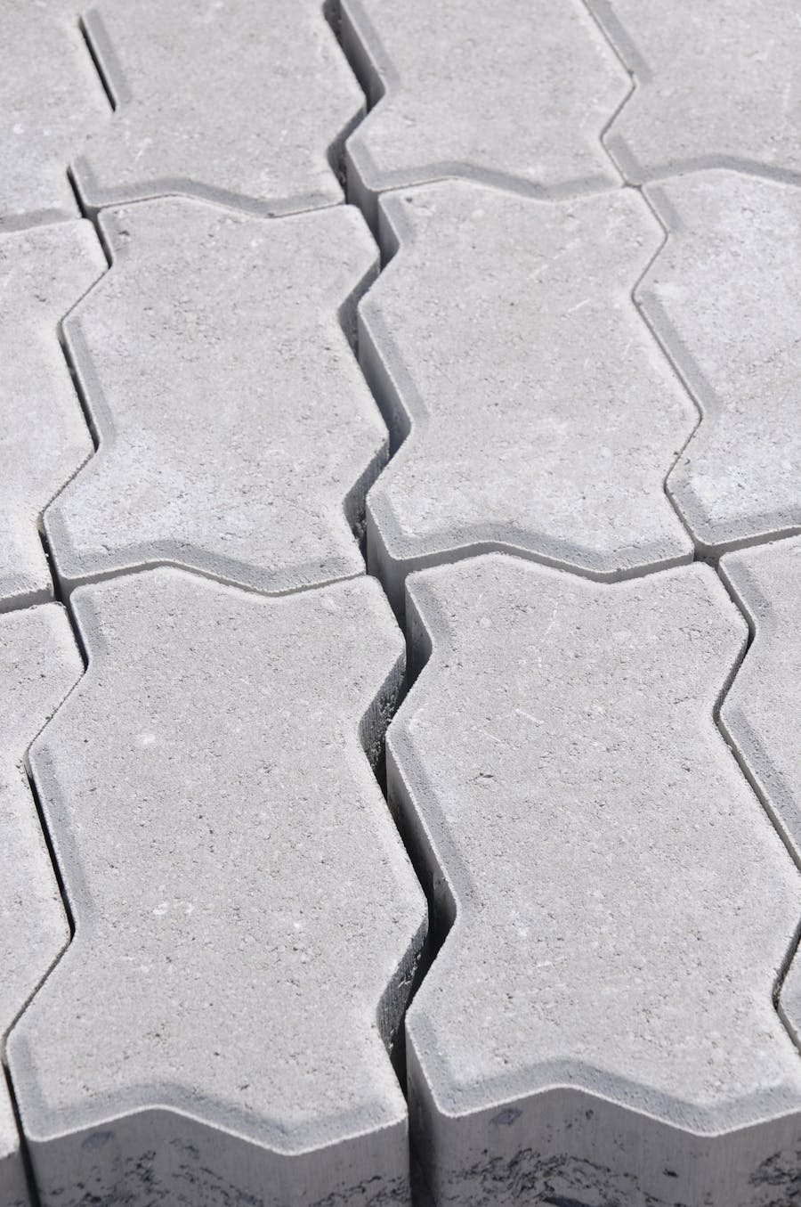 Close-up of interlocking concrete pavers showing the consistent joints between them